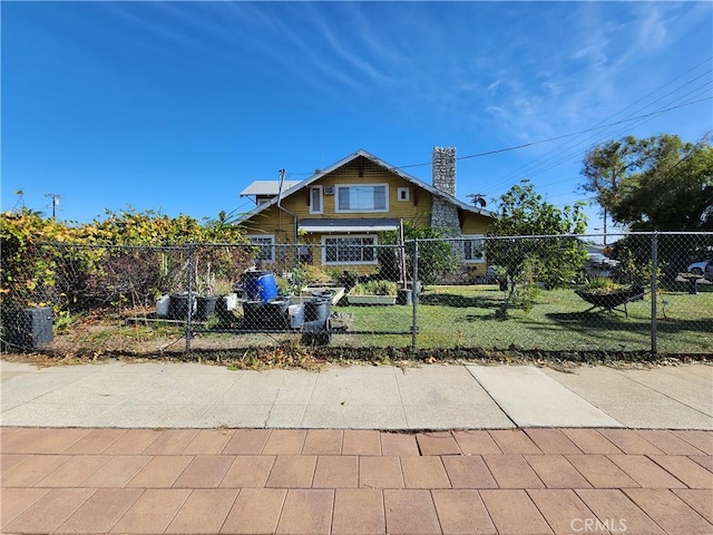 view of front of property with a front lawn