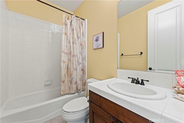 full bathroom with vanity, toilet, and shower / tub combo