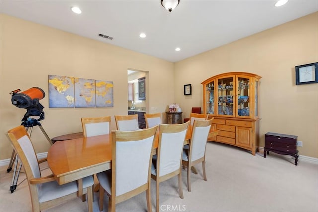 view of carpeted dining room