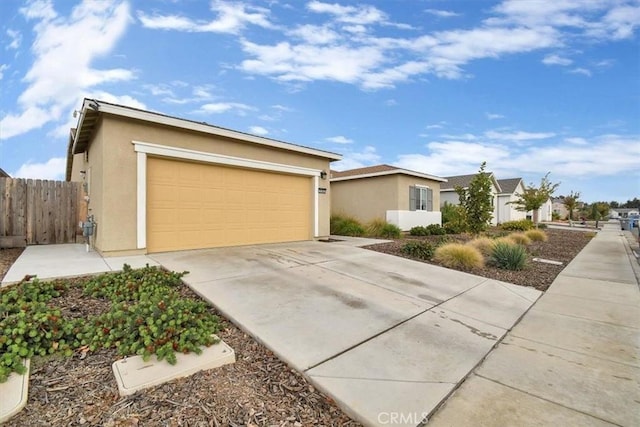 ranch-style house featuring a garage