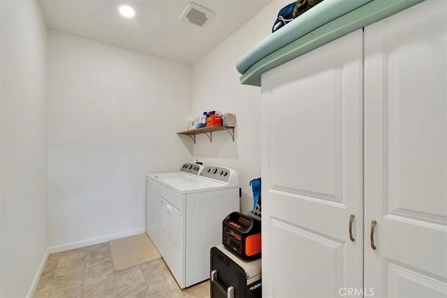 laundry room featuring separate washer and dryer