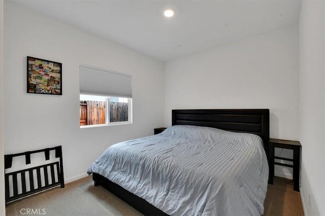 bedroom featuring carpet