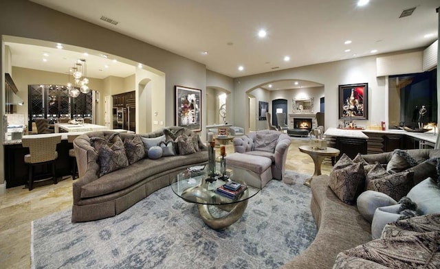 living room with a chandelier