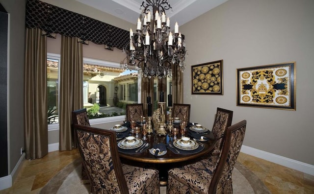 dining space featuring plenty of natural light, an inviting chandelier, and ornamental molding