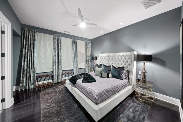 bedroom with ceiling fan and hardwood / wood-style floors