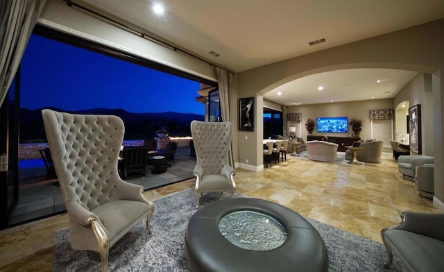 view of patio / terrace with an outdoor living space with a fire pit