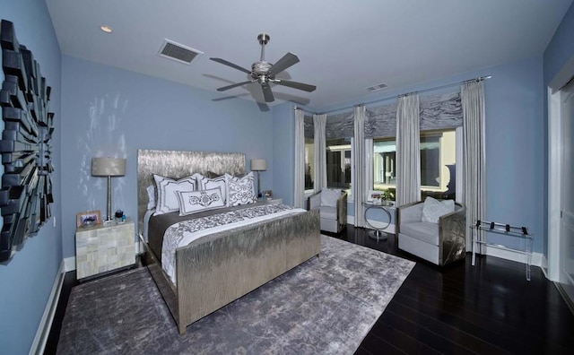 bedroom featuring dark hardwood / wood-style floors and ceiling fan