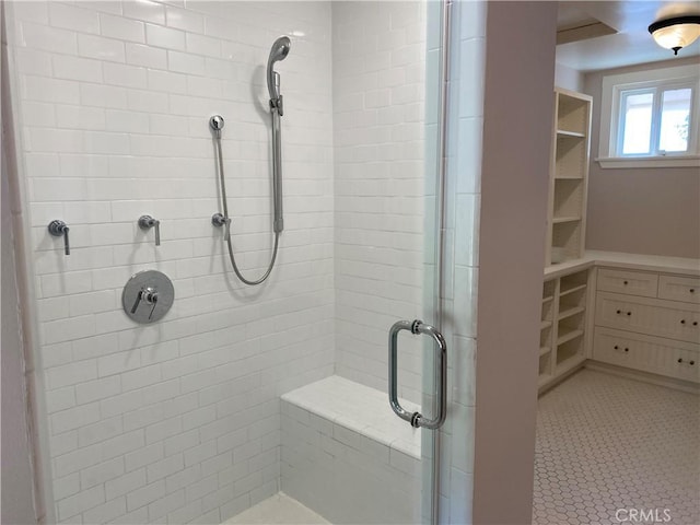 bathroom with an enclosed shower