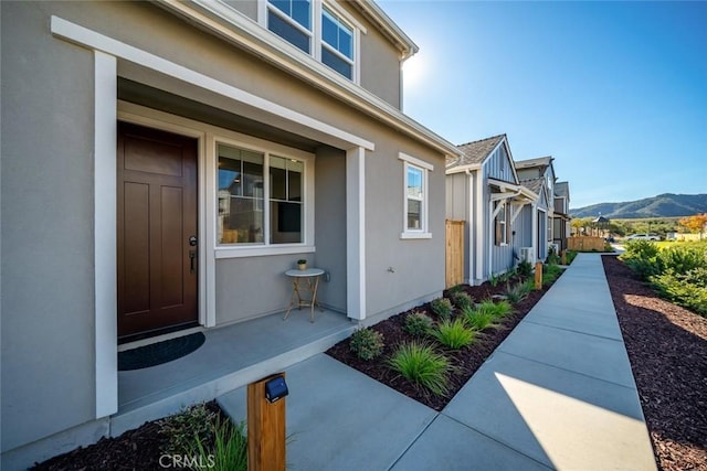 entrance to property with a mountain view