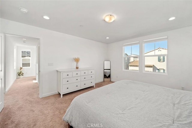 bedroom with light carpet