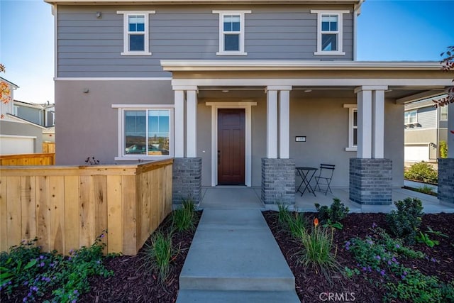 view of front of property featuring covered porch