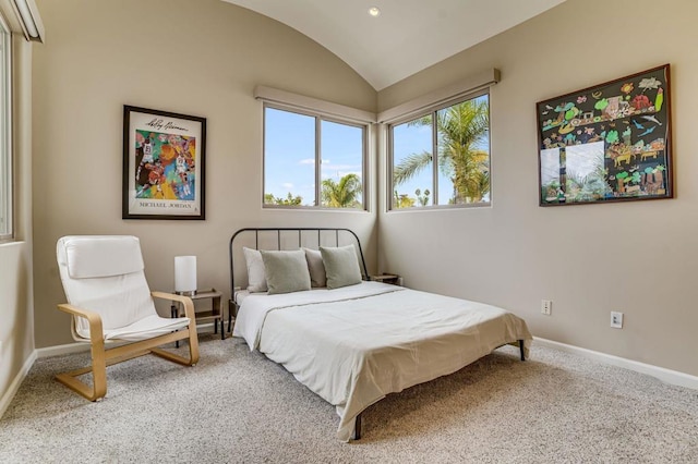 bedroom featuring carpet flooring and vaulted ceiling