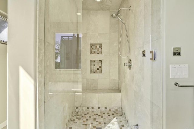 bathroom featuring walk in shower