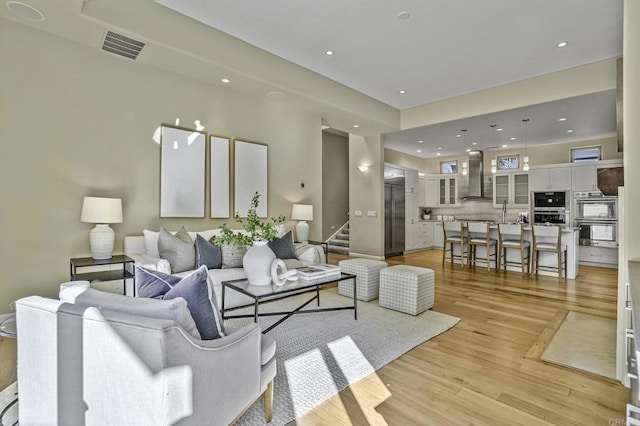 living room featuring light wood-type flooring