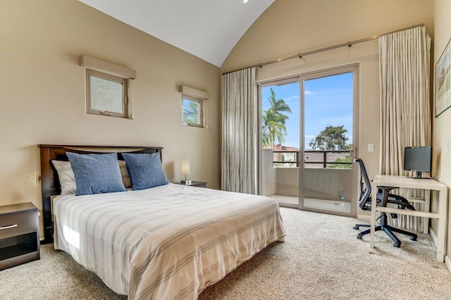 carpeted bedroom with lofted ceiling and access to outside