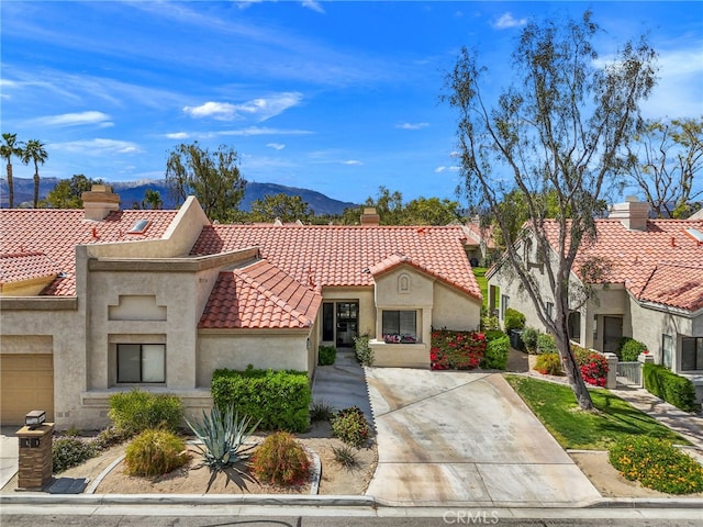 view of front of house featuring a mountain view