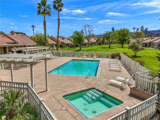 view of pool featuring a patio area, a pergola, and a hot tub