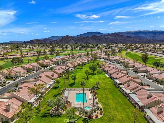 birds eye view of property featuring a mountain view