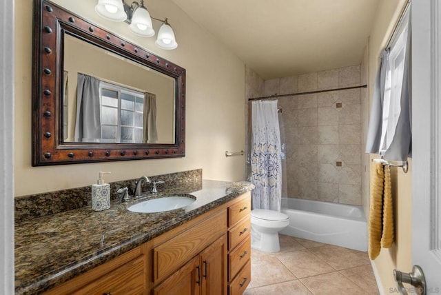 full bathroom with toilet, shower / tub combo, vanity, and tile patterned floors