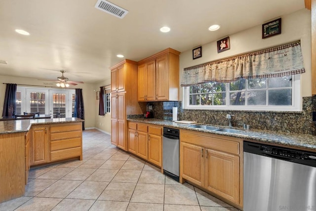 kitchen with french doors, sink, stainless steel dishwasher, ceiling fan, and tasteful backsplash