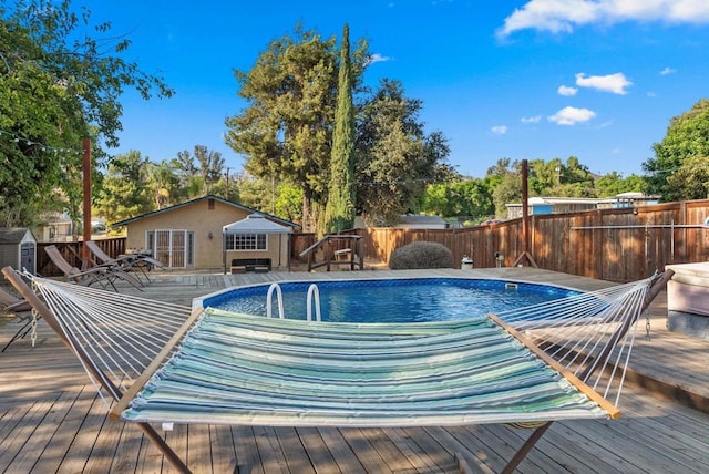 view of pool with a deck