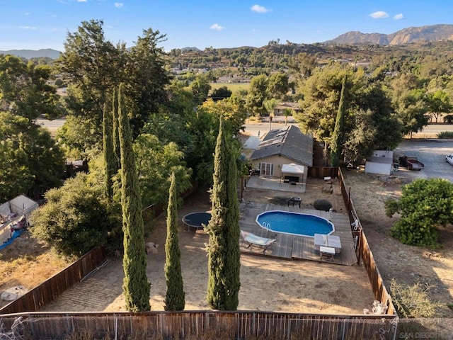 view of swimming pool featuring a mountain view