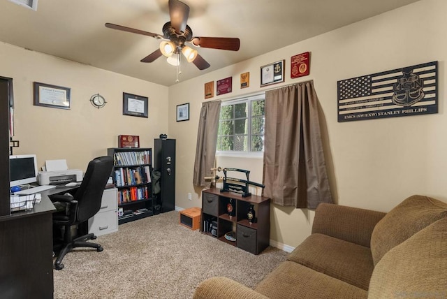 home office featuring ceiling fan and carpet floors