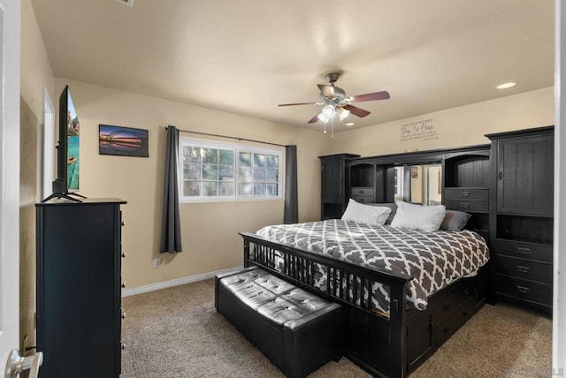 carpeted bedroom featuring ceiling fan