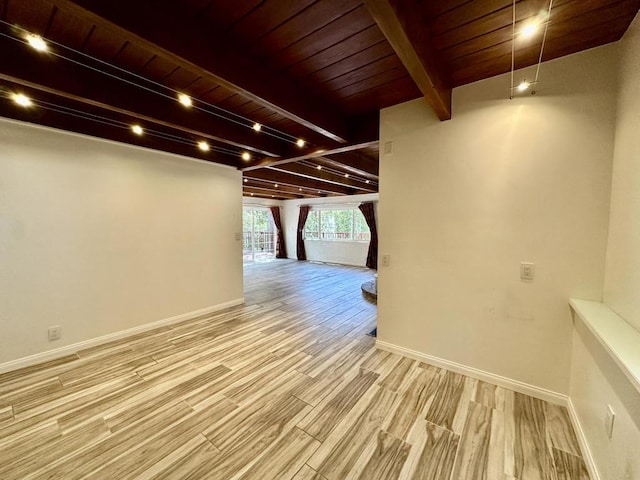 corridor with beam ceiling, light wood-type flooring, and wooden ceiling