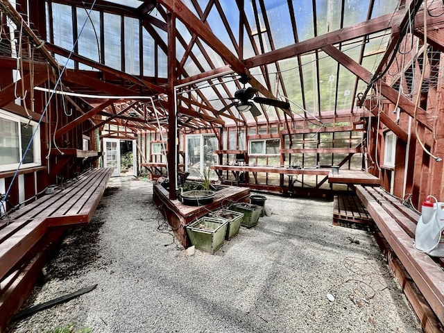 exterior space with ceiling fan and a wooden deck