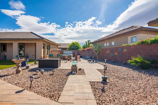 view of yard featuring a patio and an outdoor hangout area