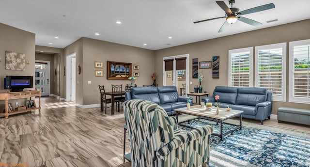 living room with ceiling fan