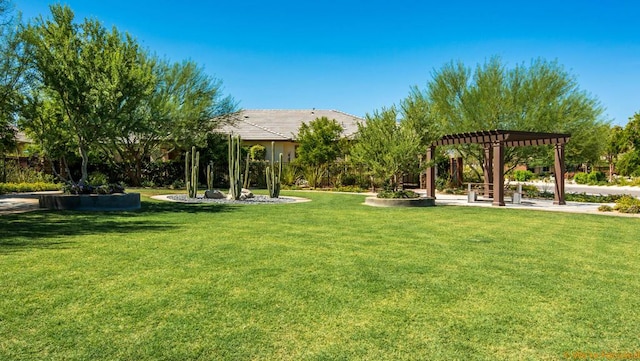 view of yard with a pergola