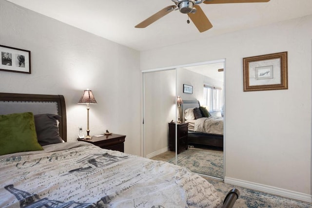 bedroom with ceiling fan and a closet