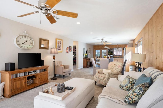 living room featuring wooden walls