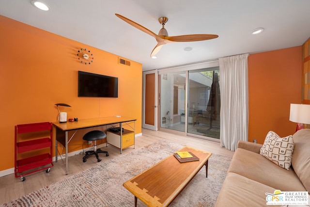 office area featuring light wood-type flooring and ceiling fan