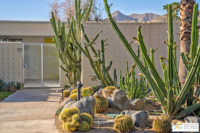 exterior space featuring a mountain view