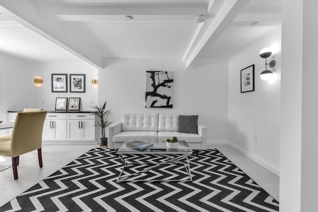 living room with beam ceiling