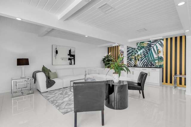 dining room with beamed ceiling and wooden ceiling