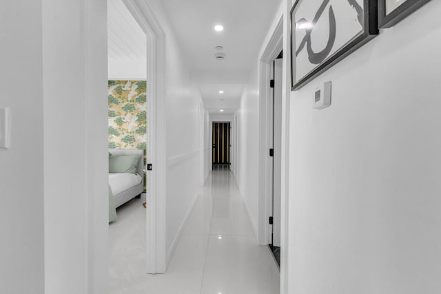 hallway with light tile patterned flooring