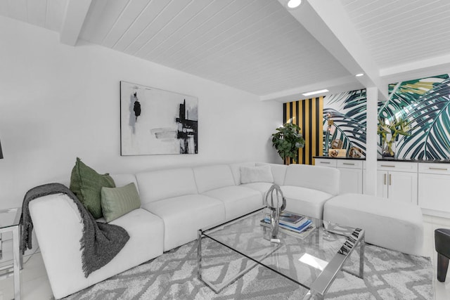 living room featuring beam ceiling