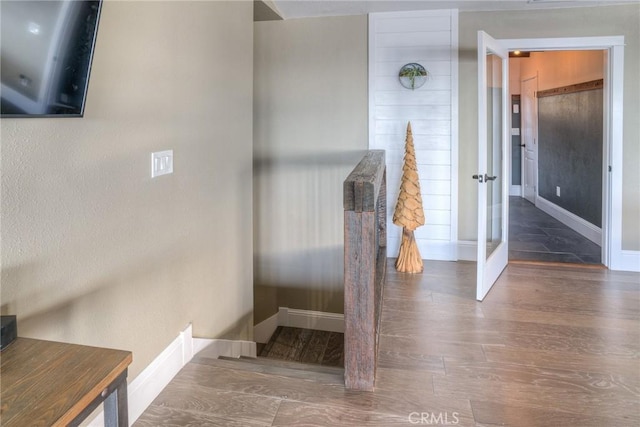 stairway with wood-type flooring