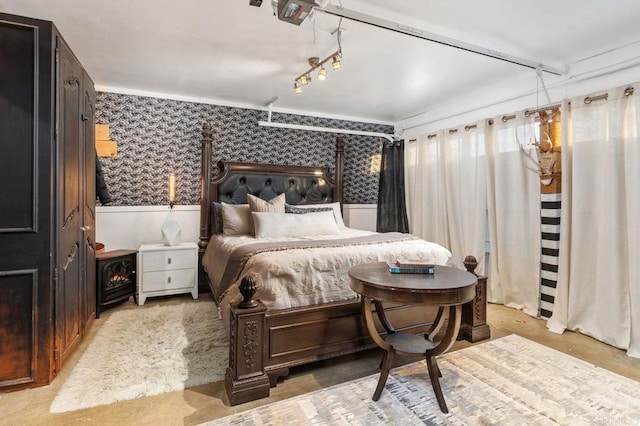 bedroom featuring concrete flooring