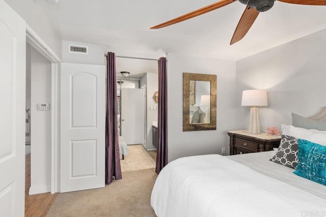 bedroom featuring ceiling fan and light wood-type flooring