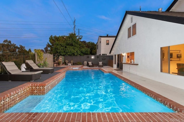 view of pool featuring a patio