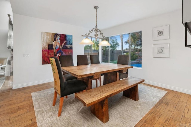 dining room with hardwood / wood-style flooring