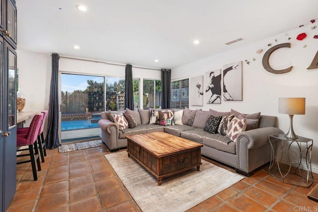 living room with tile patterned floors