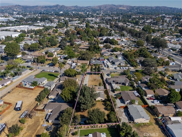 drone / aerial view featuring a mountain view