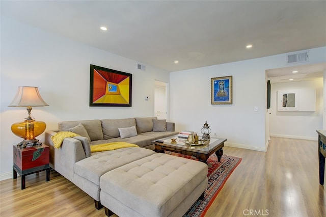 living room featuring light hardwood / wood-style floors