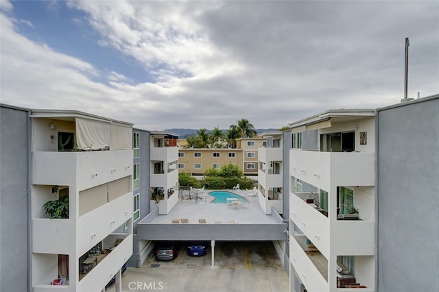 view of property featuring a community pool